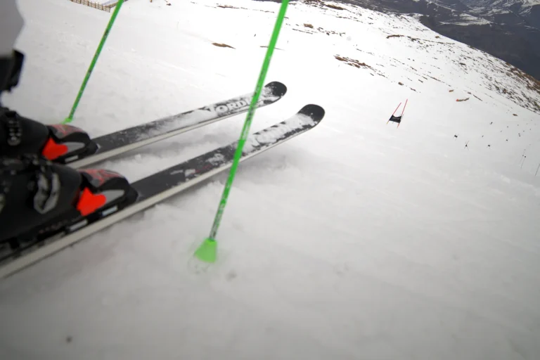 Close-up of race skis and poles during a training session