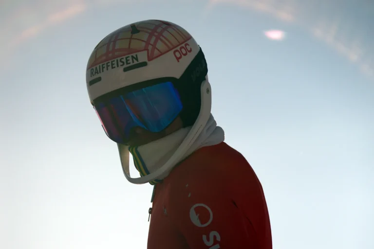 Ski racer focusing before a race run in the morning sun