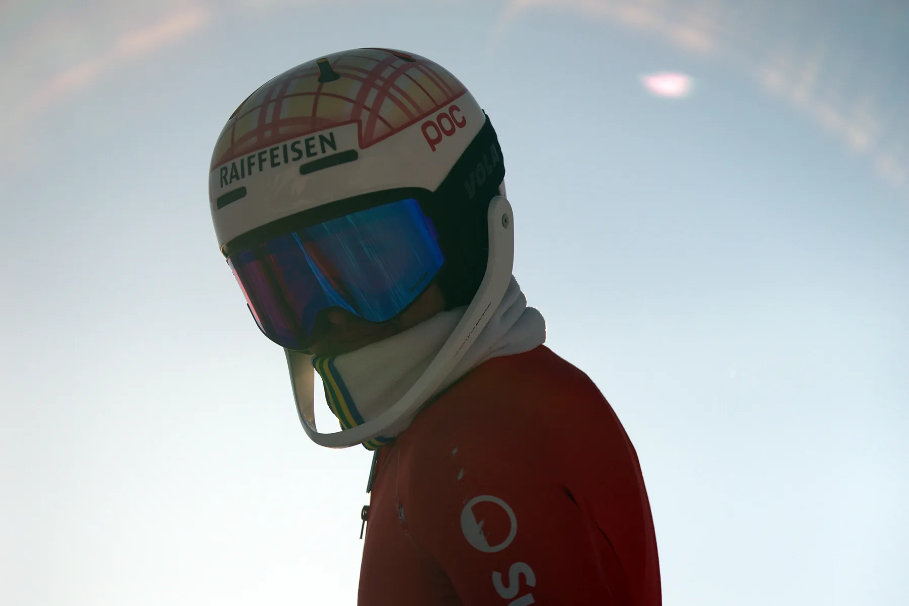 Ski racer focusing before a race run in the morning sun